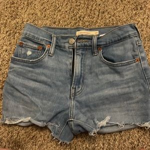 Levi high rise; size 24. Like new, worn only a handful of times.
